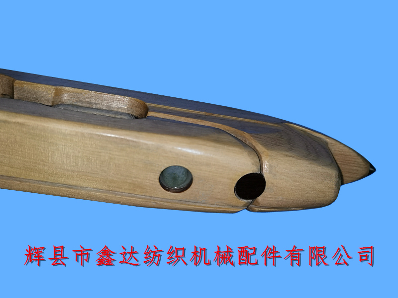 自動換紆織機偏頭梭側面